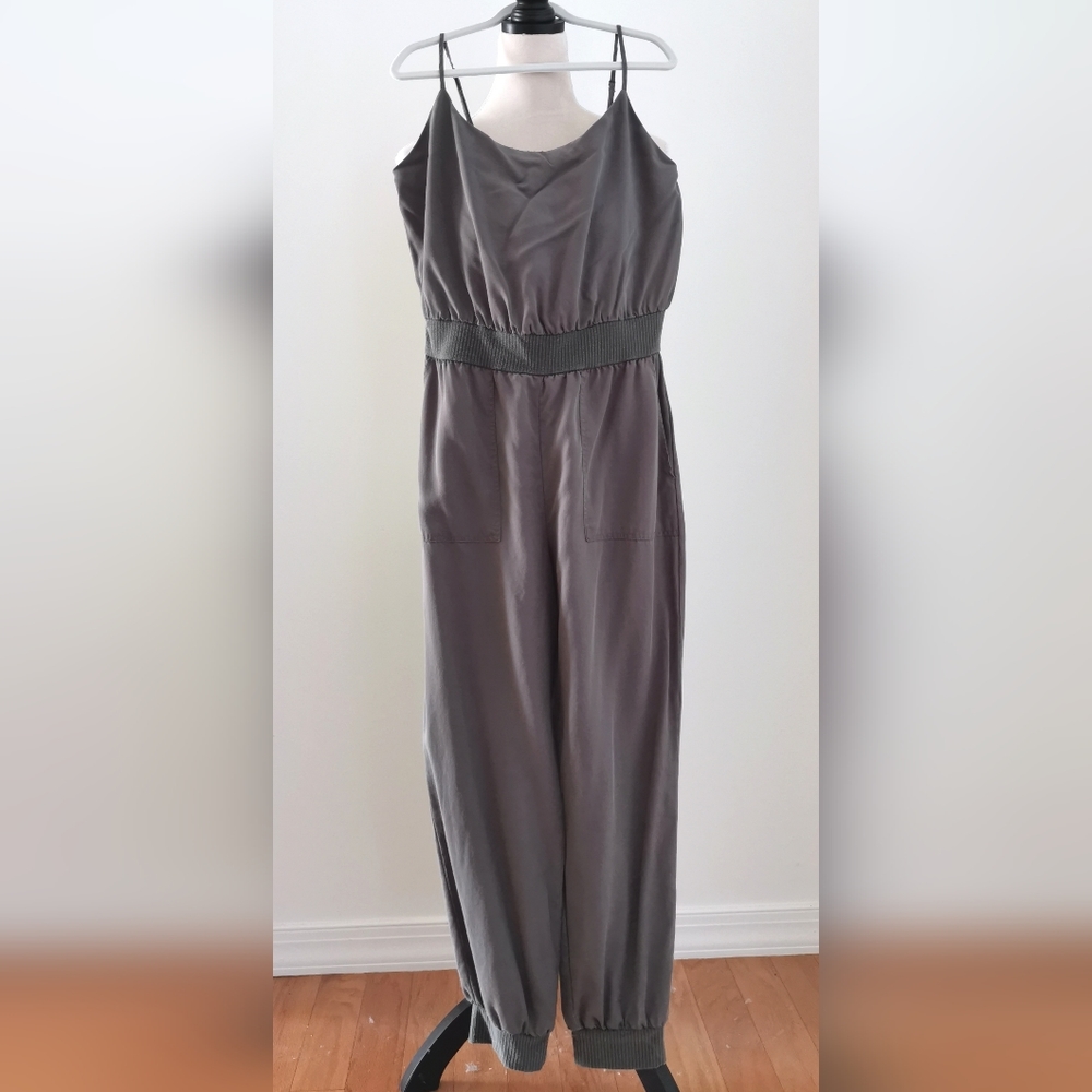 Anthropologie jumpsuit moss olive green size medium